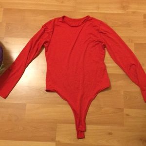 Red long sleeved leotard